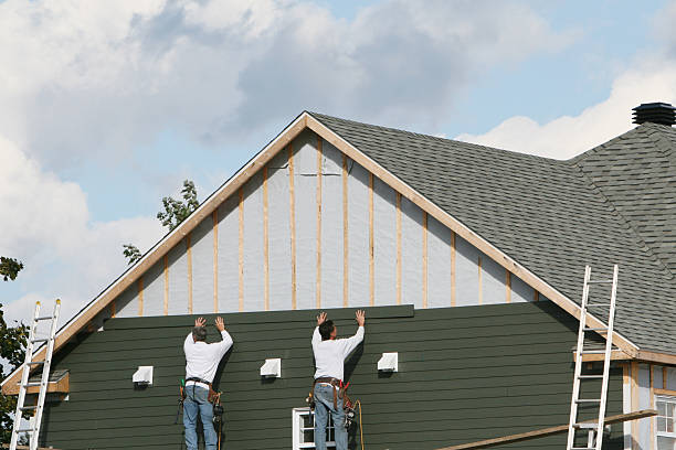Professional Siding Replacement technician working in Maineville, OH